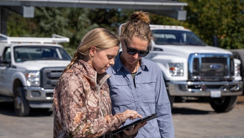 a guy looking at a tablet