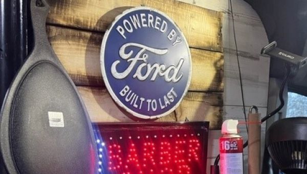 a guy looking at a tablet