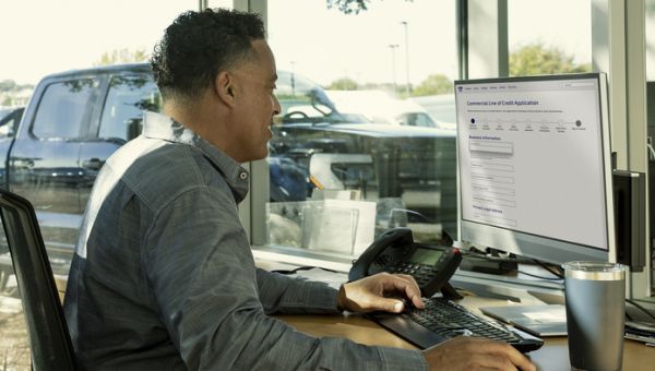 a guy looking at a tablet