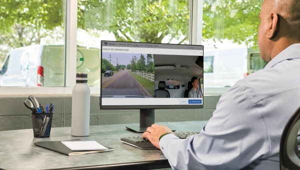 a guy looking at a tablet