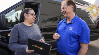 a guy looking at a tablet