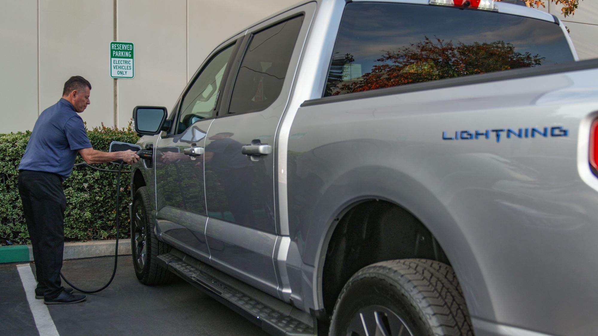 a guy looking at a tablet