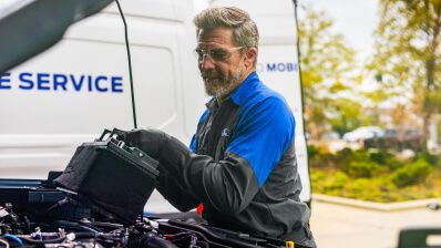 a guy looking at a tablet