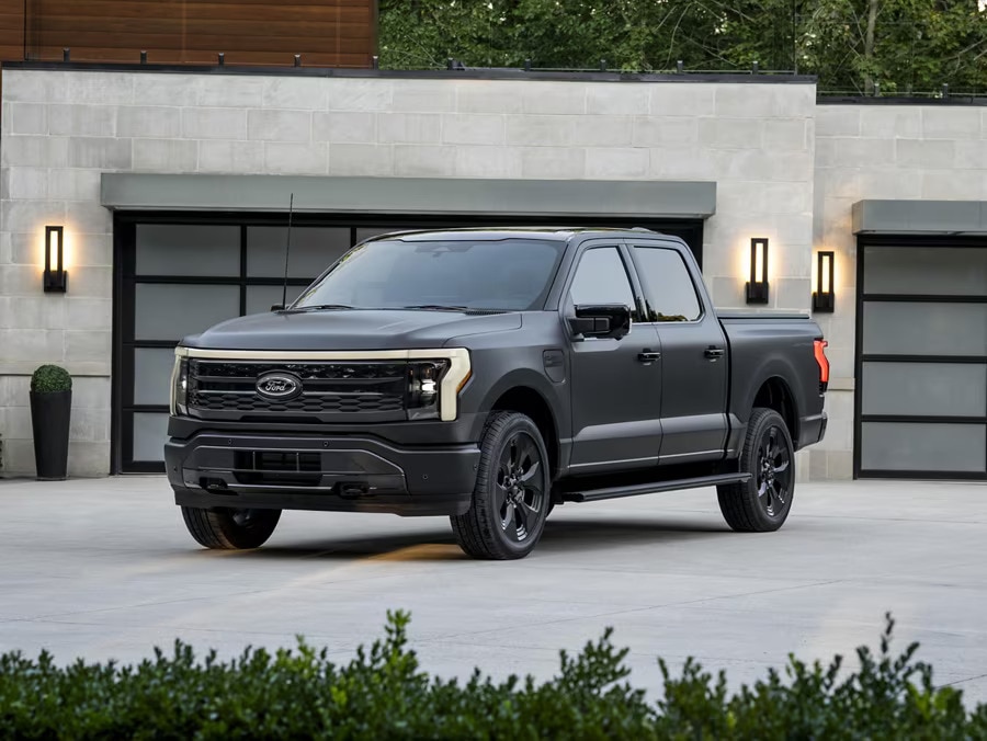 A 2024 Ford F-150 Lightning Platinum Black pickup truck