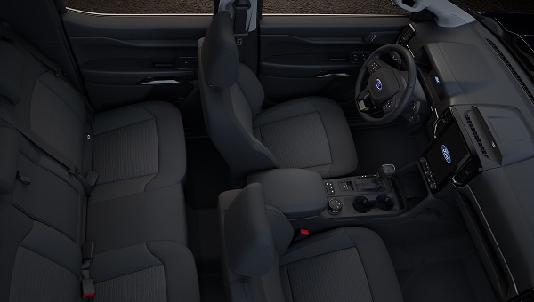 Interior de Ford Ranger 2026, vista aérea de asientos y consola.