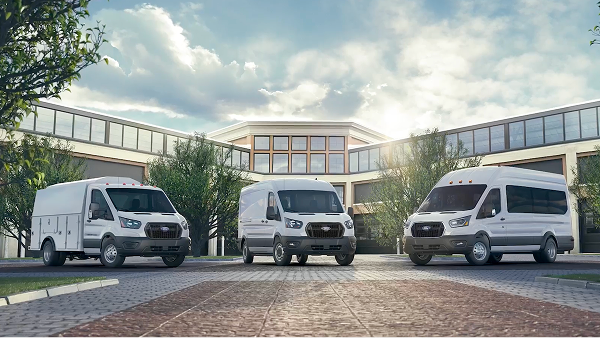 A pack shot of white commercial vehicles: a Transit Chassis Cab, Transit Cargo Van, and Transit Passenger Van.