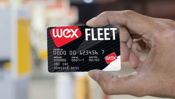 Image showing a hand holding a WEX Fuel Card.