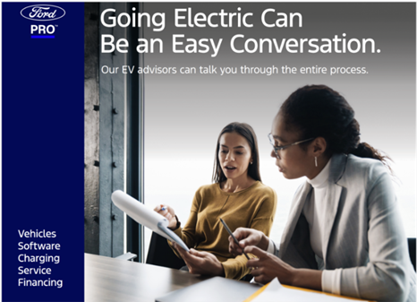 Two women sit together reviewing documents in an office setting next to text promoting Ford Pro EV advisory support for an easy transition to electric vehicles.