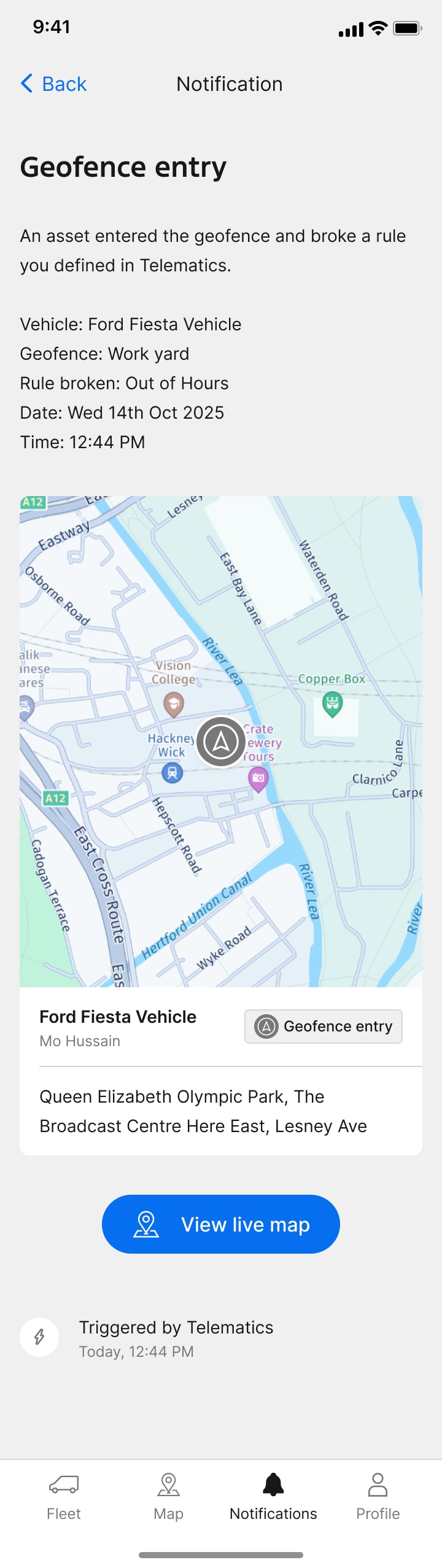 A mobile notification screen reports that a vehicle entered a geofence and triggered an out-of-hours rule, showing the vehicle’s map location and details below.