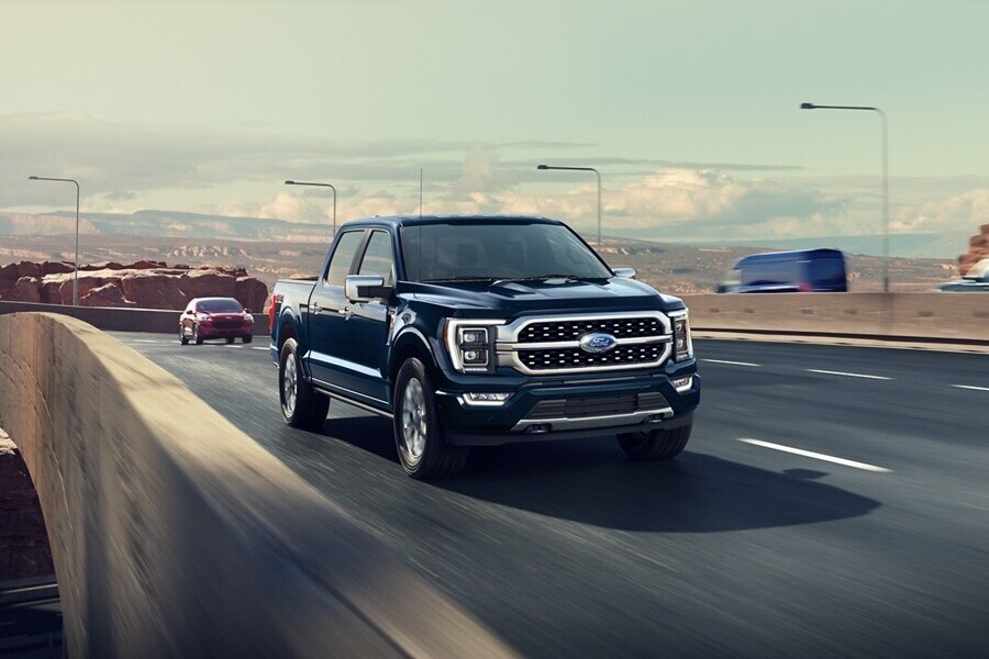 2023 Ford F-150® Platinum being driven on an expressway