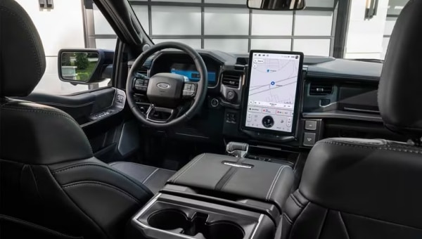 A 2024 Ford F-150 Lightning Platinum Black pickup truck