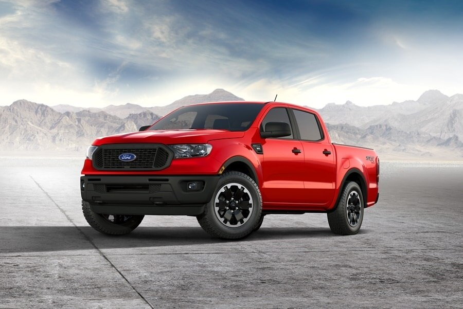 2023 Ford Ranger® in Race Red with STX Appearance Package parked near mountains