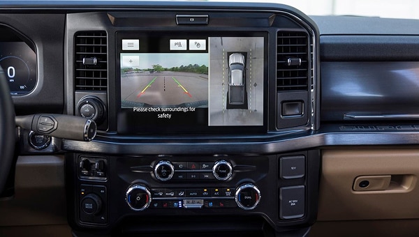 Ford Co-Pilot360 in-vehicle display showing 360-degree camera view of surroundings.