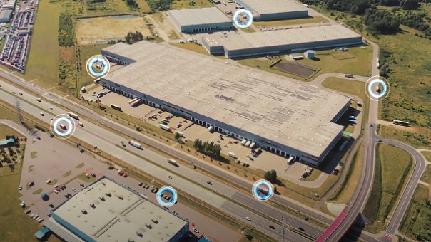 Ford Pro Solutions video thumbnail showing large fleet facility.