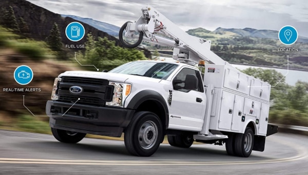 Ford Pro connected vehicle with service equipment driving