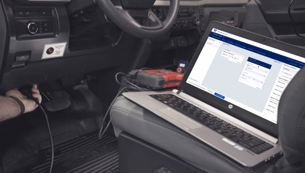 An upfit equipment plugged into the vehicle for installing modifications.