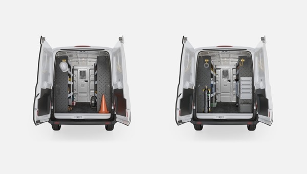 Two Ford Pro vans with open rear doors, showing organized interior upfits for tools, safety gear, and equipment storage.